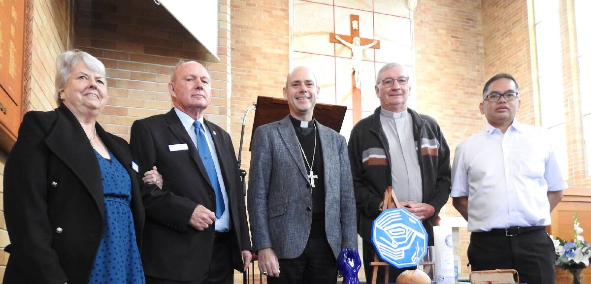 Grassroots guru: Jennifer and Paul Burton with Bishop Michael Kennedy, Father John Curran parish priest of Manilla and Father Roel Llave parish priest of Armidale in De La Salle Chapel on April 23. Picture: supplied.
