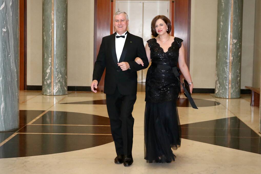 Minister for Small Business Michael McCormack and his wife Catherine arrive at the 2016 Mid Winter Ball at Parliament House in Canberra. Picture: Photo Alex Ellinghausen