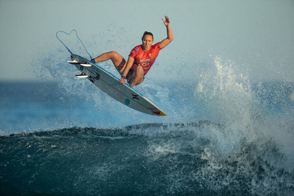 Carissa Moore, four-time world champion from Hawaii scored a 9.9 at Newcastle for this ride. Photo: Marina Neil, Newcastle Herald
