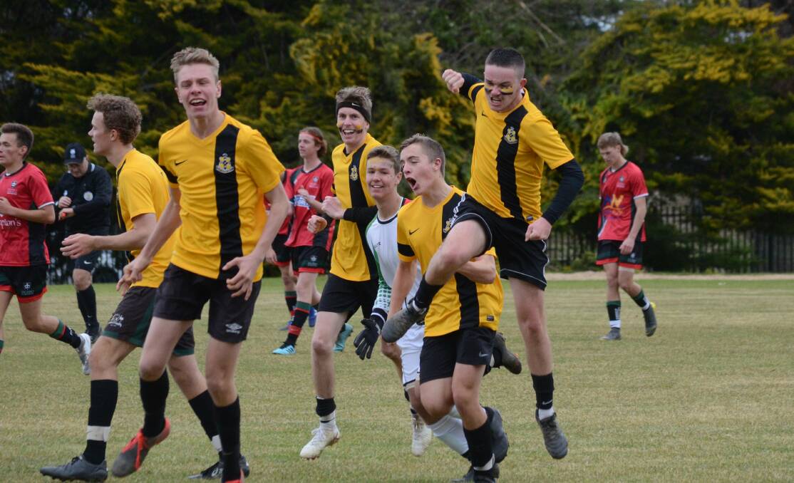 Caleb Frecklington celebrates what was the winning goal for Orange High School against Dubbo College. Photo: Riley Krause, Central Western Daily