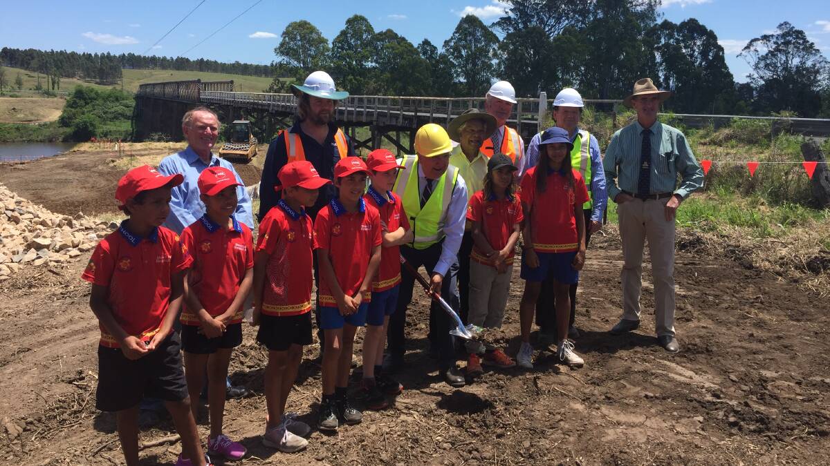 School children were there to see Member for Lismore turn the first sod on the new Tabulam bridge.