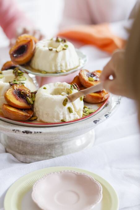 Ricotta cakes with honey and roasted peaches. Picture: Supplied
