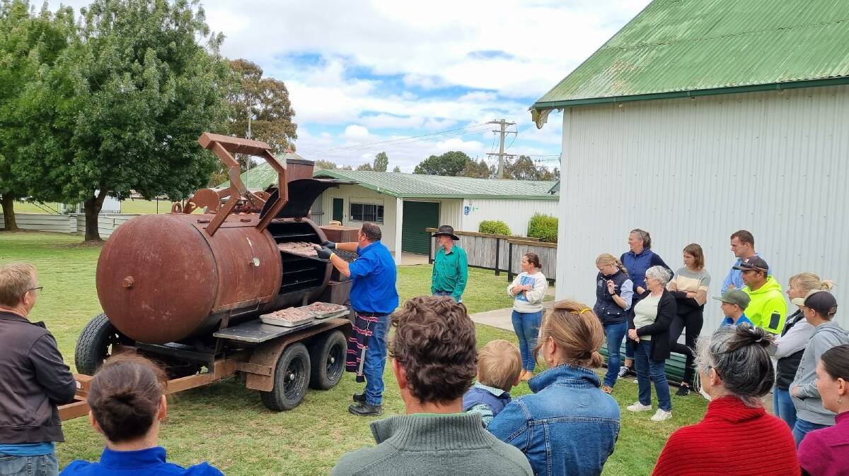 Butcher Dale Goodwin demonstrating the salami making process at a recent session in Uralla. Picture supplied.