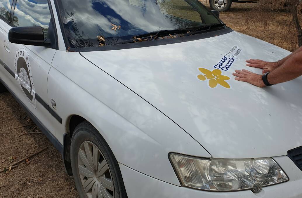 Jan and Rick Phipps' 2003 VY Commodore can be decorated however they want for the Shitbox Rally, provided the Cancer Council and rally stickers are on the hood and front doors. They've opted to carry the handprints of local cancer survivors and battlers.