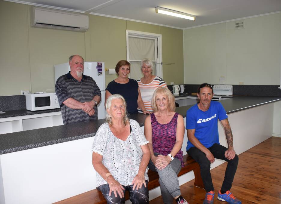 Tennis Association members (at back) Gerrard Kelly, Karen Forbes and Fay Pampling; and (front) Cathy Potter, Christine Foster and Andrew Doig among the clubhouse upgrades.