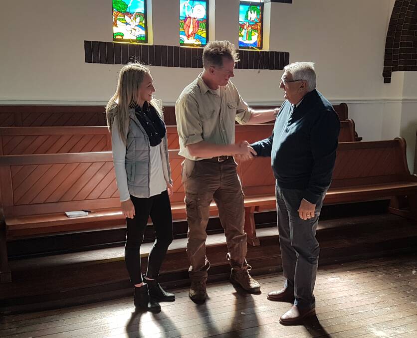 Entrepreneurs Bianca Wicks and Steve Haslam with MP Thomas George in the historic church the couple are renovating as a community centre.