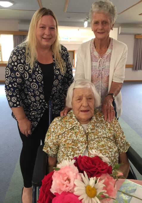 Muriel Murphy was spoiled with birthday cake, flowers and gifts on turning 103 at Millrace. She's pictured here with Jacqui Chorley and Rita Schroder.