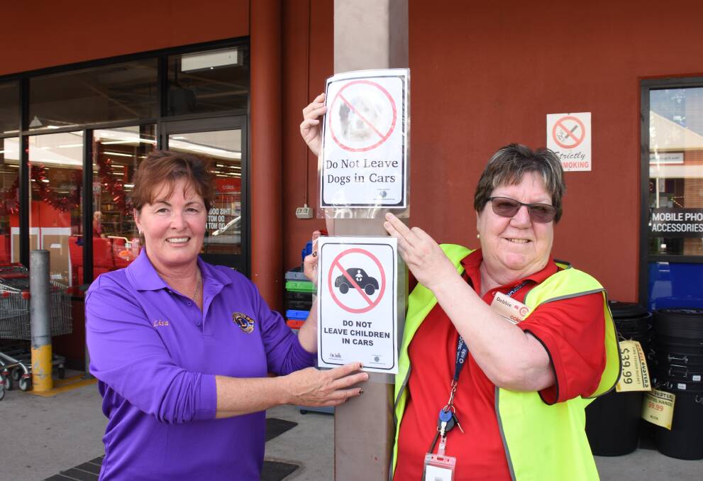 Lions' Lisa Dalton and Coles' Debbie Willis remind shoppers not to leave animals in kids in hot cars.
