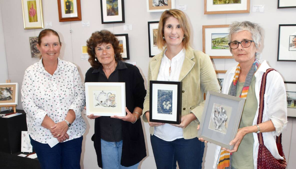Sponsor Kerri Swain with Rebecca Berrett, Kylie Heindrich and Judy Harris, and their prize-winning 9 by 5 entries.