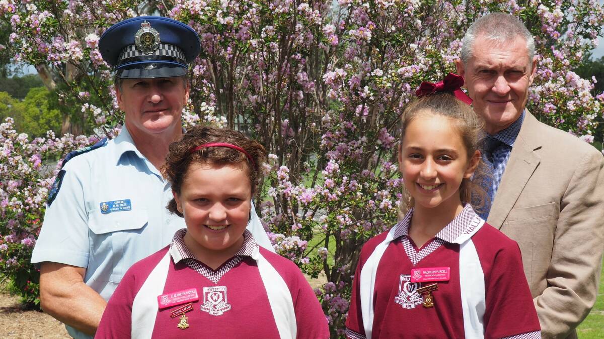 Sergeant Alan Baker and Assistant Regional Director Graeme Lacey were special guests at the ceremony which saw Maddison Purcell and Elizabeth Noble presented with their school captain badges.
