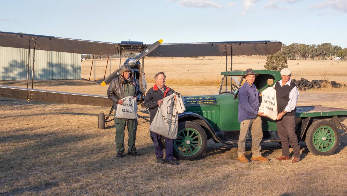 Pilot Bill Finlen, Geoff Wotherspoon, Luke McDermott and Rod Taylor at Sunnyside airfield for the 2020 reenactment of Australia's first official airmail. The event is now the inspiration for an acquisition art prize.