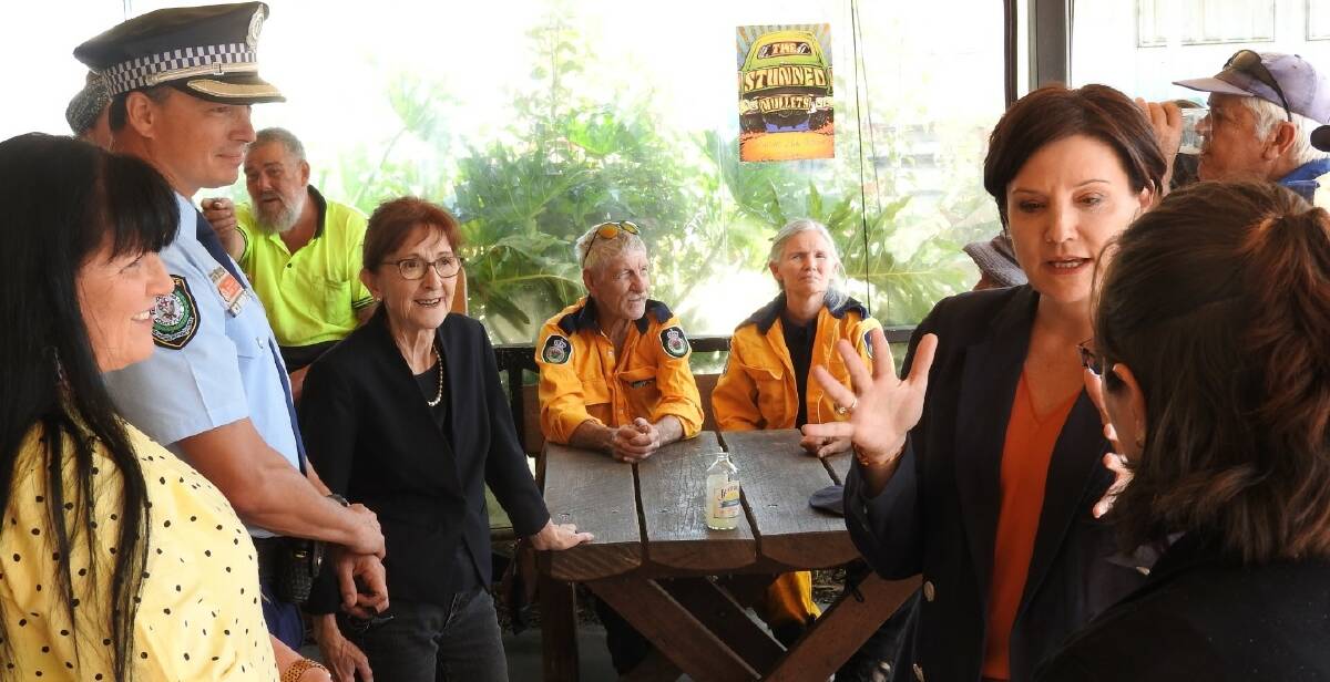 Pictured thanking Drake RFS Brigade members for a job well done are (from left) Tenterfield Shire Councillor Bronwyn Petrie, Chief Inspector Darren Cloake and Lismore MP Janelle Saffin, as NSW Opposition Leader Jodi McKay speaks with Drake's Lunatic Hotel licensee Amanda Hartley who provided meals and shelter to residents displaced by the Long Gully Road fireas well as feeding hundreds of firefighters.