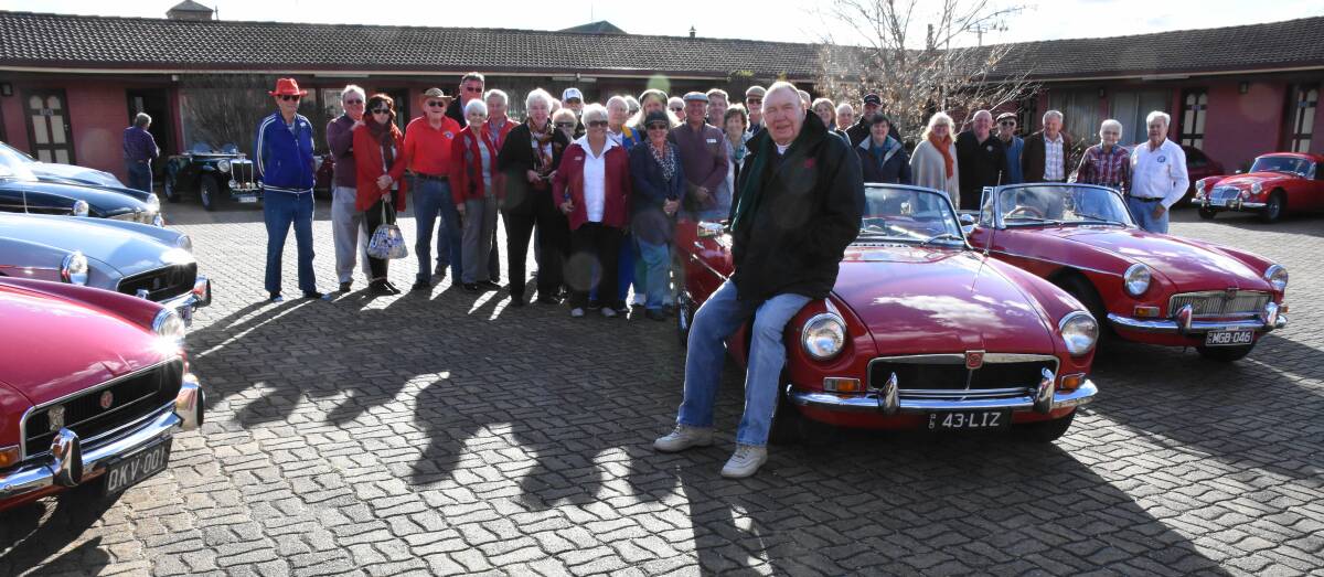 Trip organiser Jim Lutherborrow  with fellow members of the Gold Coast MG Car Club as they descend on the Best Western The Henry Parkes Tenterfield Hotel for Christmas in July.