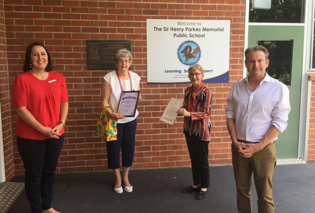 GRANDPARENT OF THE YEAR: Jann Oberman, second from left, accepts her award from Lismore MP Janelle Saffin. Watching on are Principal Anna Starcevic and NSW Shadow Minister for Local Government and Veterans Greg Warren MP.