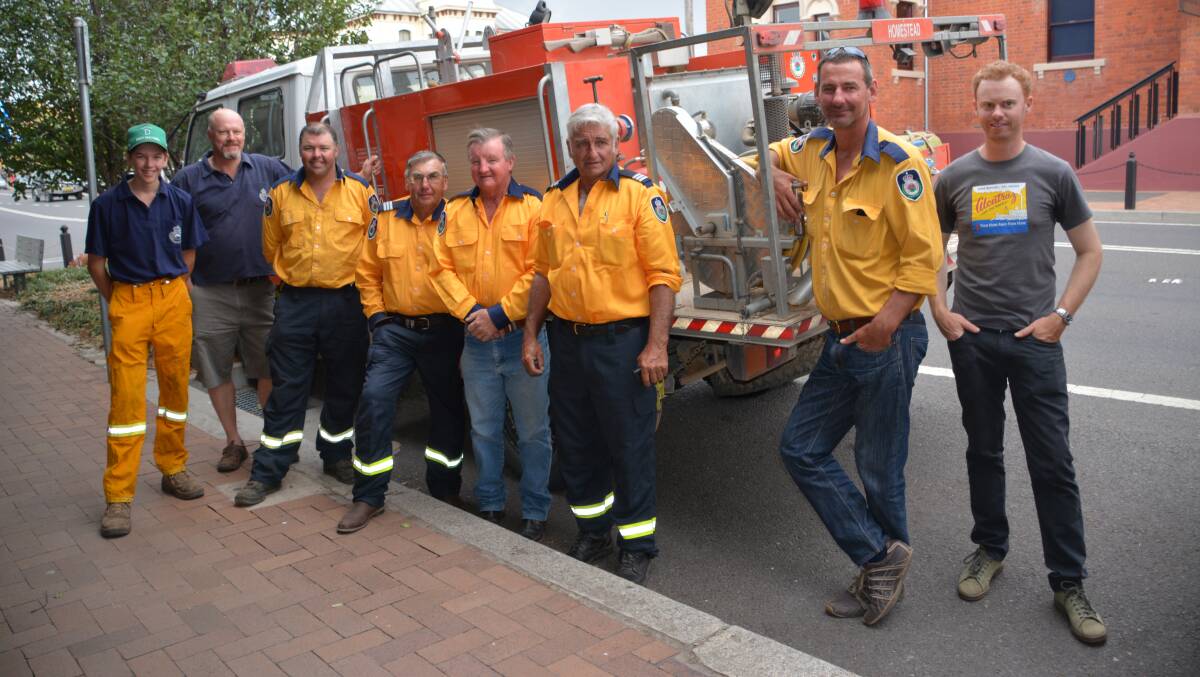 Firies were called away during their fundraising art auction to fight yet another fire.