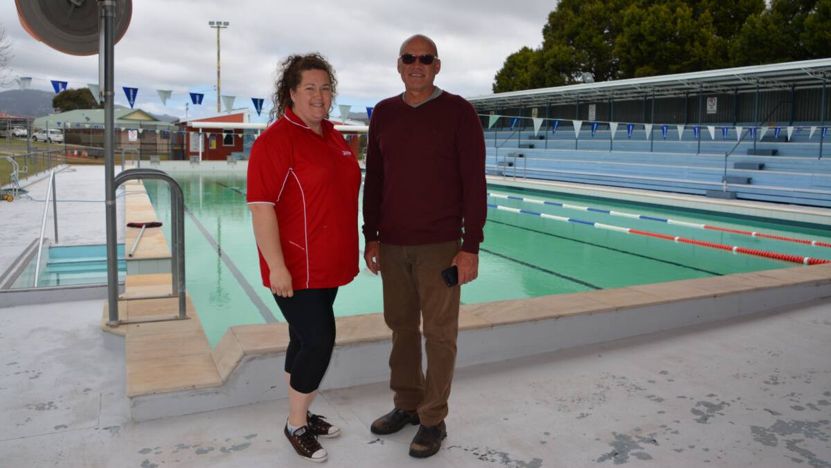 Tenterfield Pool was feeling a little green on the weekend. Pool manager Lauren Lavea is pictured here with Justin Lemberg, who will be conducting a swimming clinic on November 3.