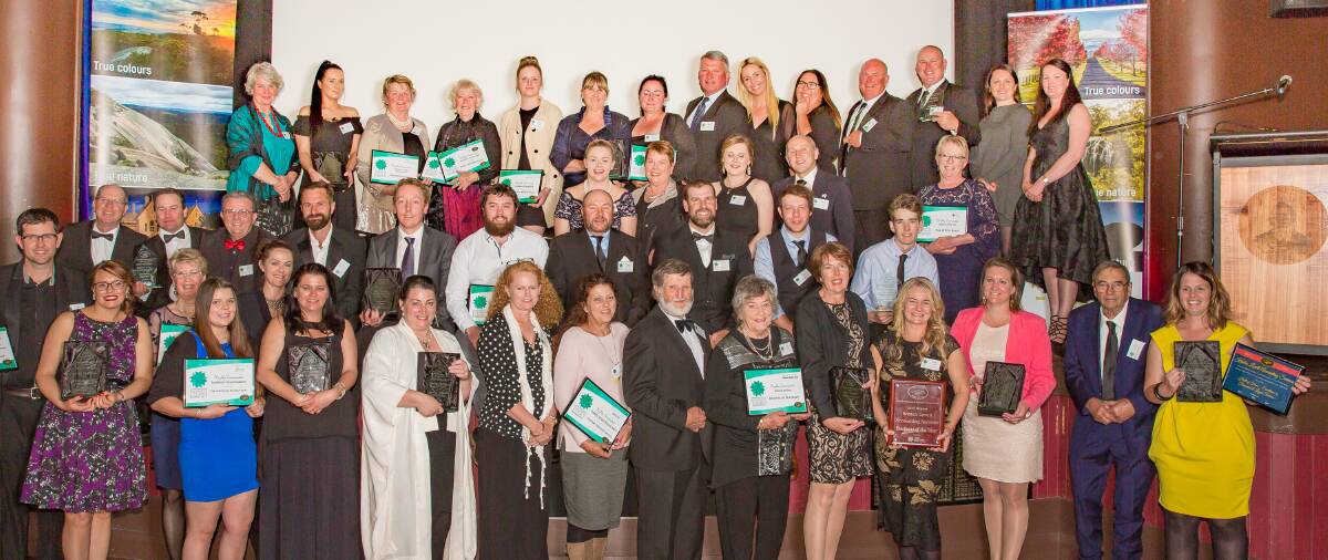 Awardees in the 2017 Tenterfield Business & Tourism Excellence Awards line up for a group photo. Photo by Peter Reid.