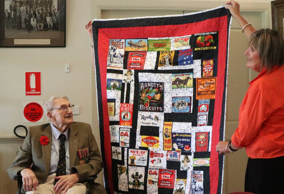 Robert Noel Ritchie Smith -- better known as ‘Bob’ -- with daughter Pene Brown at the presentation of his Quilt of Valour at the RSL Pavilion.
