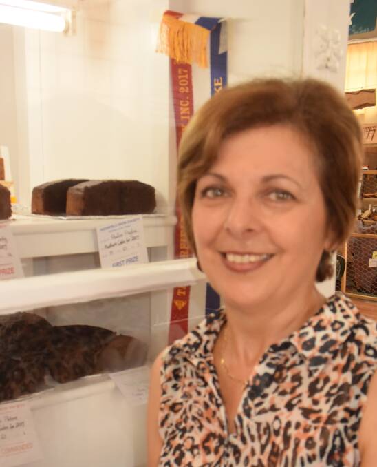 Pauline Puglisi with her winning Chocolate Beetroot Cake, the feature cake for the 2017 Tenterfield Show.