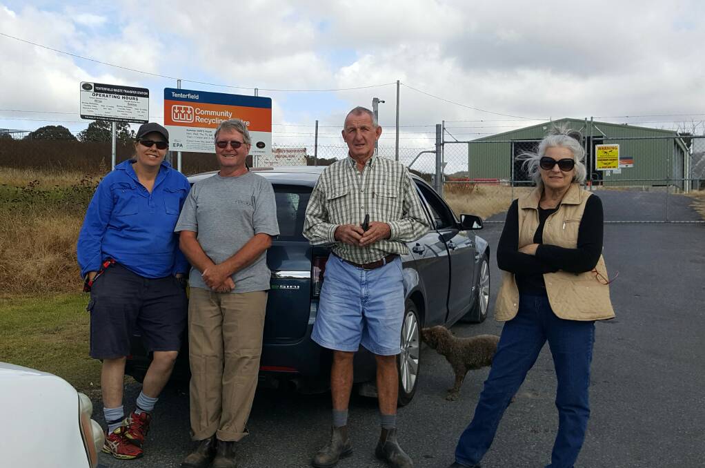 Dodge Landers (second from right) joins with other ratepayers to admire the view while they await the opening of the Recycling Centre.
