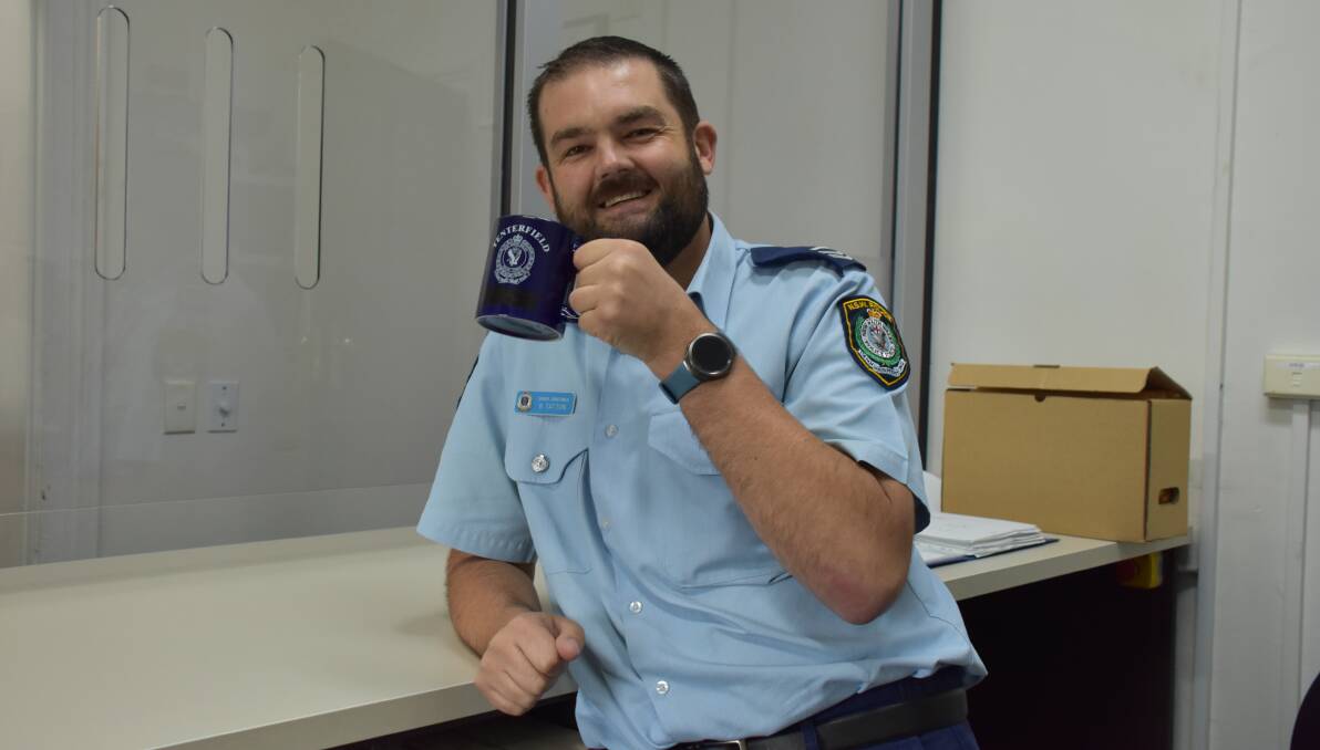 Senior Constable Ben Tatton and his colleagues are buying the drinks at 'Coffee with a Cop' at the Corner Cafe.