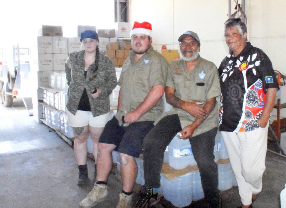 Tenterfield Water Relief's Lu Legge, Dignity Water's Ethan Pinner and Lanz Priestly, and Moonbahlene's Helen Duroux with the latest water donation.