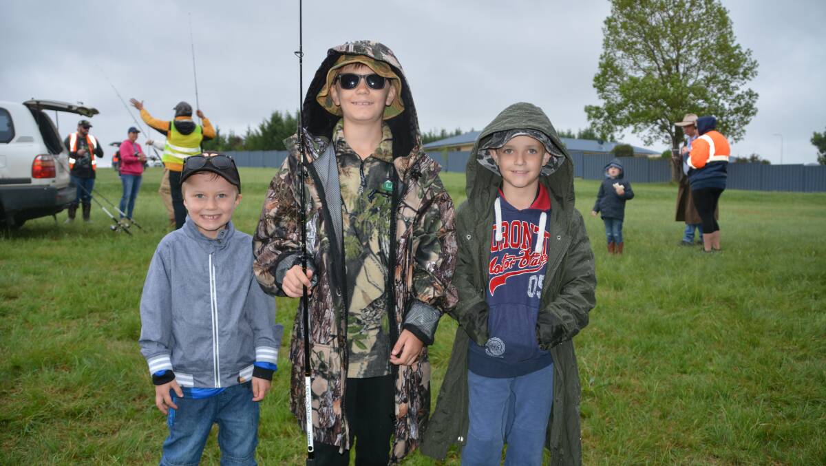 At the last Gone Fishing day held at Tenterfield Dam, in 2017, fishers like Ned Campbell, Max Keep and Ryker Montague had to rug up against the rain. Wouldn't that be good this year?