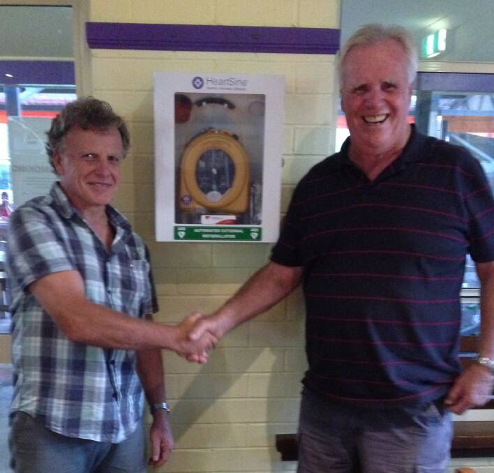 Nice doing business with you, as Drake School of Arts & Progress Association president Roger Turnerflank thanks councillor John Macnish for Tenterfield Shire Council's help in funding the defibrillator.