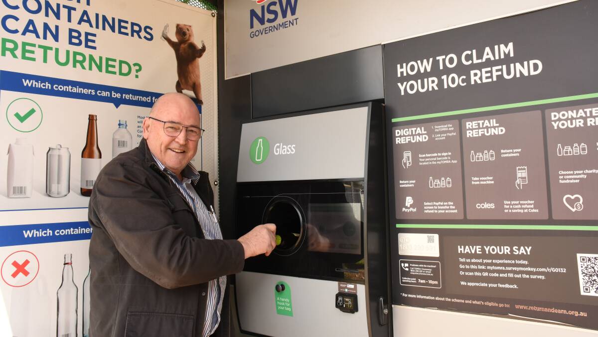 A reason to drink: Tenterfield Care Centre chair Greg Sauer at the Return & Earn reverse vending machine. TCC hopes to raise $25,000 from its six months on the donation roster. Photo: Donna Ward.