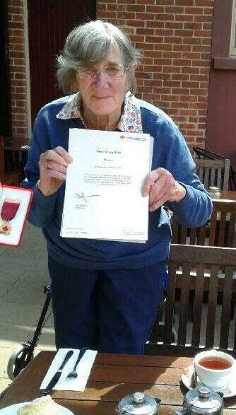 Miss Mack dedicated her long-service award to her mother and grandmother, who showed her the Red Cross way.