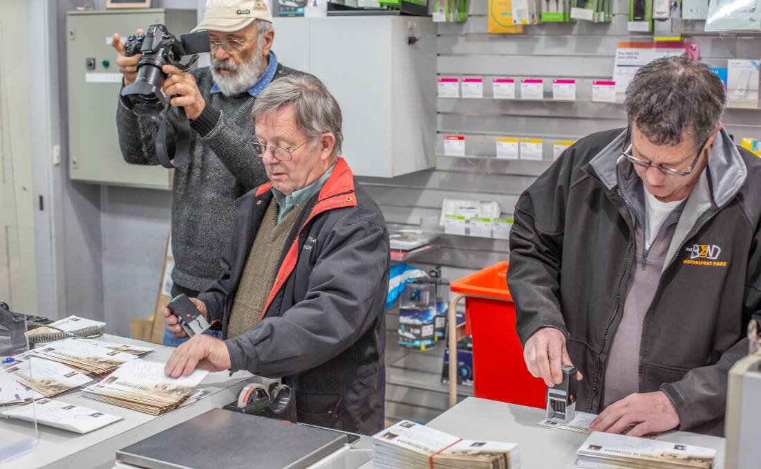 Documentary-maker Peter Harris films as Geoff Wotherspoon and Tenterfield Post Office manager Troy Gordon postmarked the special mail on the centenary run last year. The resulting film will premiere on June 26.