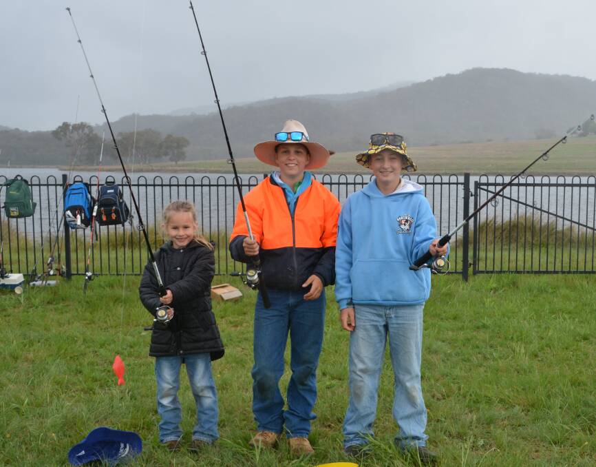 Pippa and Fletcher Koch and Tobi Lieberman braved the elements at last year's Gone Fishing day.