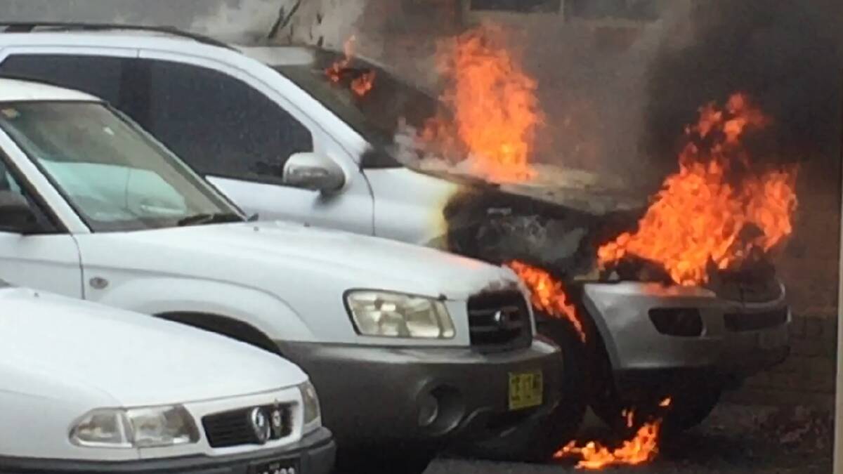 The car ablaze was very close to other vehicles. Photo: Nathan Ross.