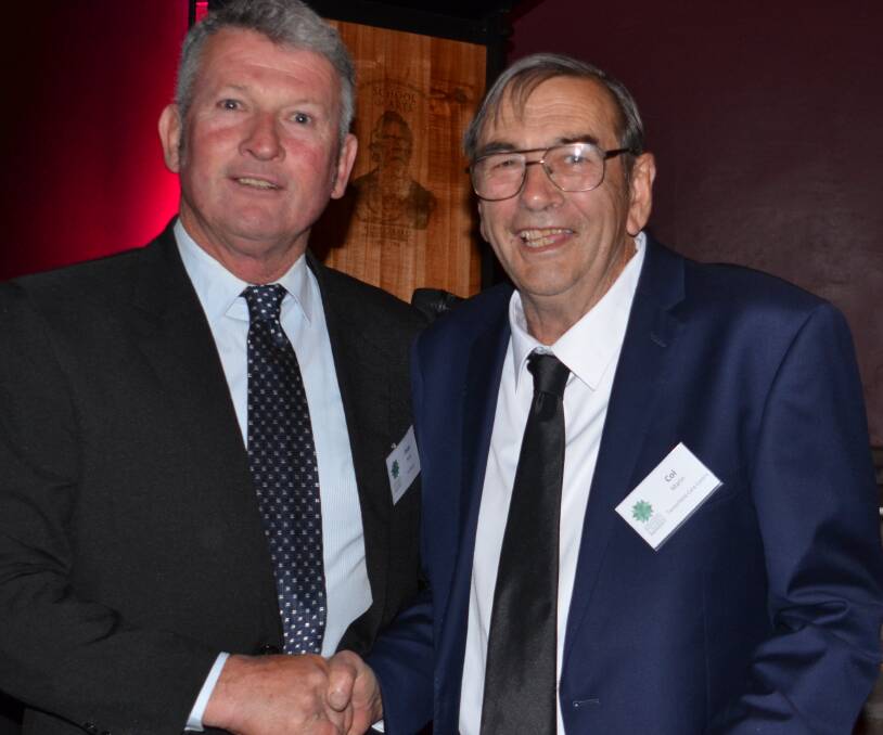 Col Mann - pictured here with Mayor Peter Petty at the 2017 Business Awards -- will be back at the School of Arts for a special tribute night on November 24.