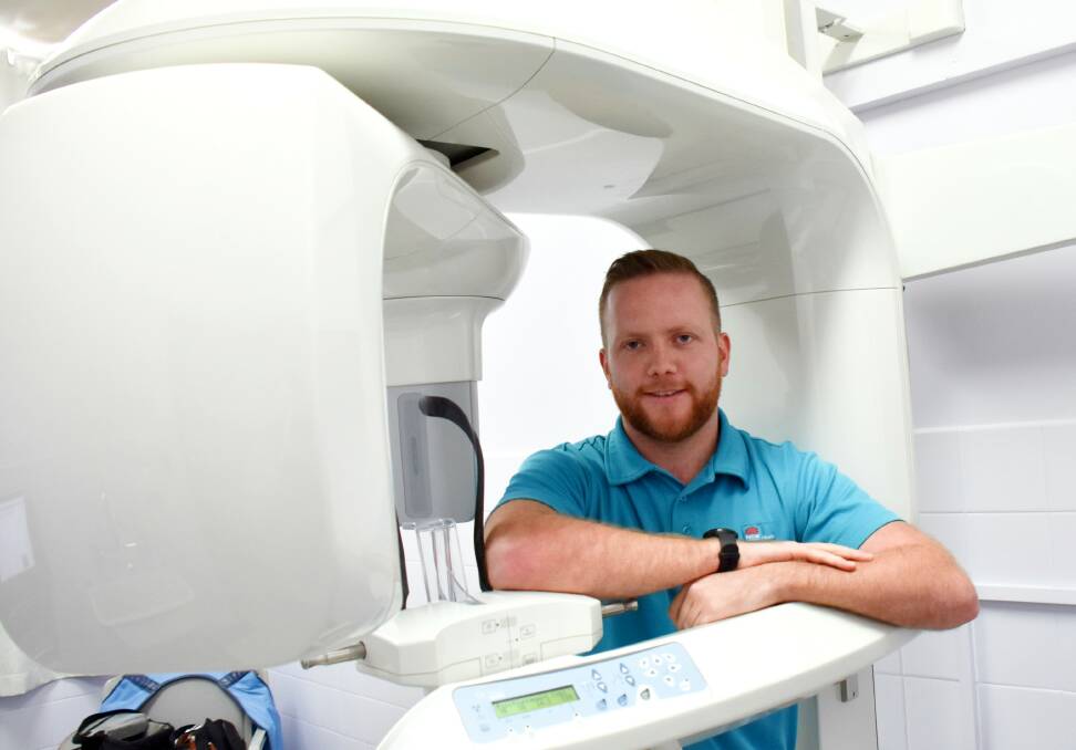 Radiologist Jacob Peiper is now onboard at Tenterfield Hospital, returning the x-ray department to full strength. Jacob is pictured with the hospital's OPG (orthopantomogram) machine, used primarily for dental x-rays.