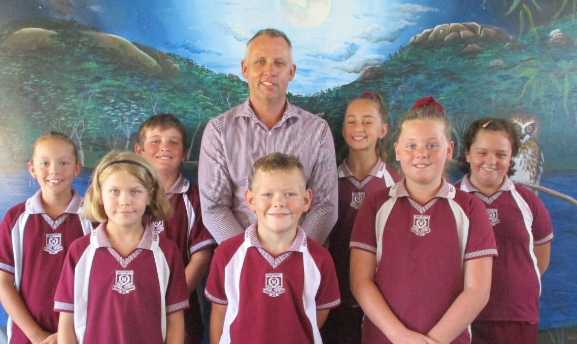 Wallangarra State School principal Scott Koch with (back row, from left) Indigenous Leaders Teniqua Humphries and Joseph Humphries (Joseph is also Waratah House Captain), Maddison Purcell and Elizabeth Noble (School Captains); and (front row, from left) Sarah Simpson (Waratah House Captain), and Levi Clark and Holly Staines (Wattle House Captains).