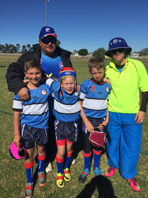 Coach Anthony Sauverian with Macintyre players and East V West selectees Oska Zappa, Fergus Elbourne and Declan Wren, with League Safe/Trainer Teegan Linwood.