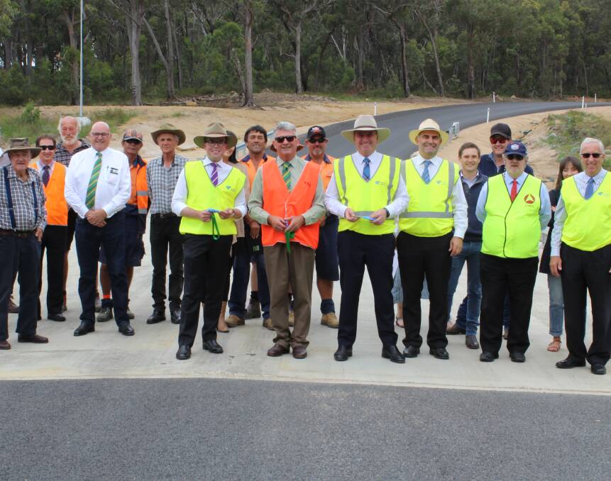 OPEN TO TRAFFIC: Digitaries joined with councillors, council staff and locals to celebrate the official opening of Bookookoorara Bridge.