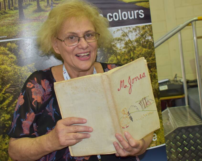 Australia Day ambassador Susanne Gervay was thrilled to uncover a little piece of history in a Deepwater secondhand shop, in the form of embroidery work by Maree Parker (nee Jones) done as a schoolgirl.