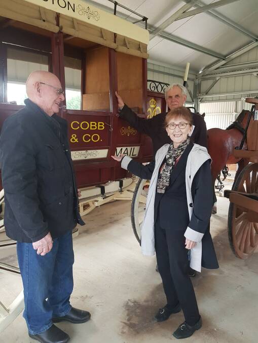 HORSE POWER: Lismore MP Janelle Saffin and Cr Gary Verri inspect John Burton's Cobb & Co Coach display in Liston. 