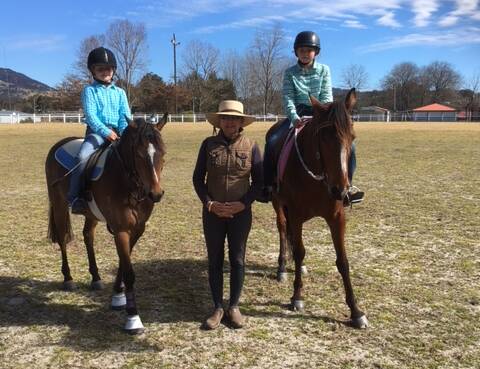 Brooke Tudor and Paige Parker with flat riding instructor Jo Fraser. (Photo by Marisa Lyons.)