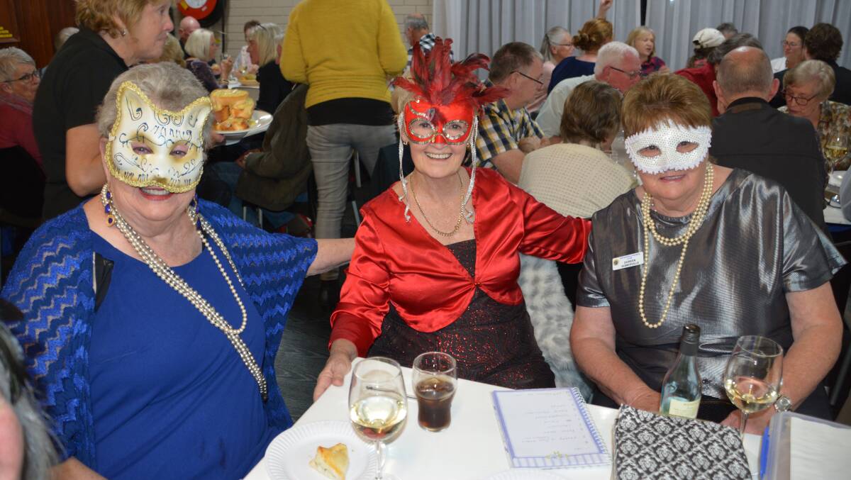 Sandra Brownrigg, Jan Ross and Doreen Somerville came in disguise at the last trivia night in 2019. This year there's a limit of 13 tables.
