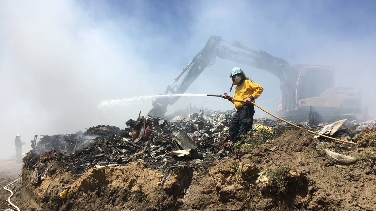 Crews from RFS, Fire & Rescue, council staff and local contractors worked together to contain the blaze.