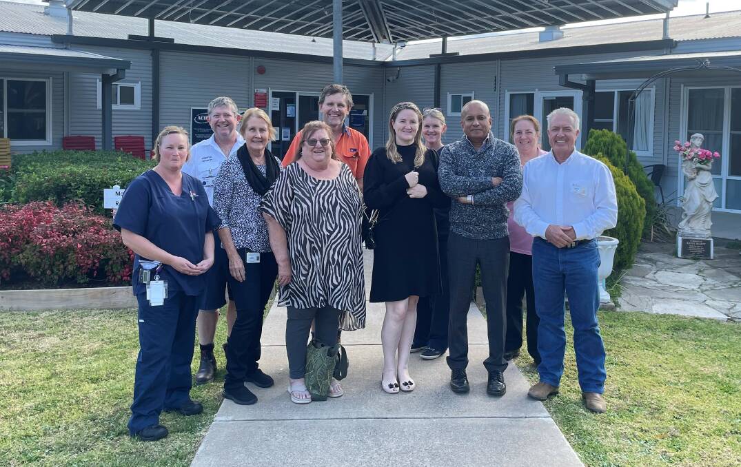 Welcome aboard: Vegetable Creek Hospital staff are happy to welcome Dr Sunil and his crew to the fold. Pictured with staff at the welcome barbecue are Dr Sunil and wife (and practice manager) Jeanette, third and fifth from the right.