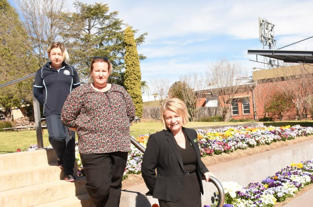 Tenterfield Chamber of Tourism, Industry and Business board members Laini Taylor, Gina Carpenter and Kristen Lovett in Bruxner Park. Ms Lovett said the chamber has a good relationship with council.
