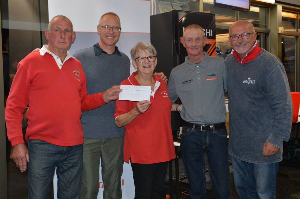 Huge haul: Birthday boy Dodge Landers, Westpac Life Saver Rescue Helicopter regional marketing manager Zeke Huish, Margaret Cooper, Michael Townes and Steve Adams at the event. Photo: Melinda Campbell.