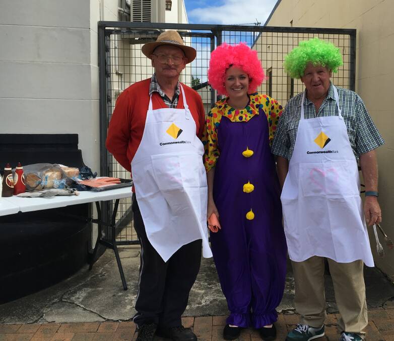 John Flint and Steve Wartnaby (with Kitty Thomas) mastered the sausage sizzle.