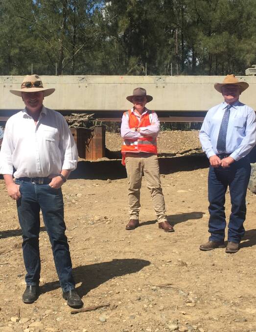 MP Barnaby Joyce, Tenterfield Shire Council CEO Terry Dodds and Mayor Peter Petty onsite at the Emu Creek Bridge, jointly-funded by federal, state and private bodies.