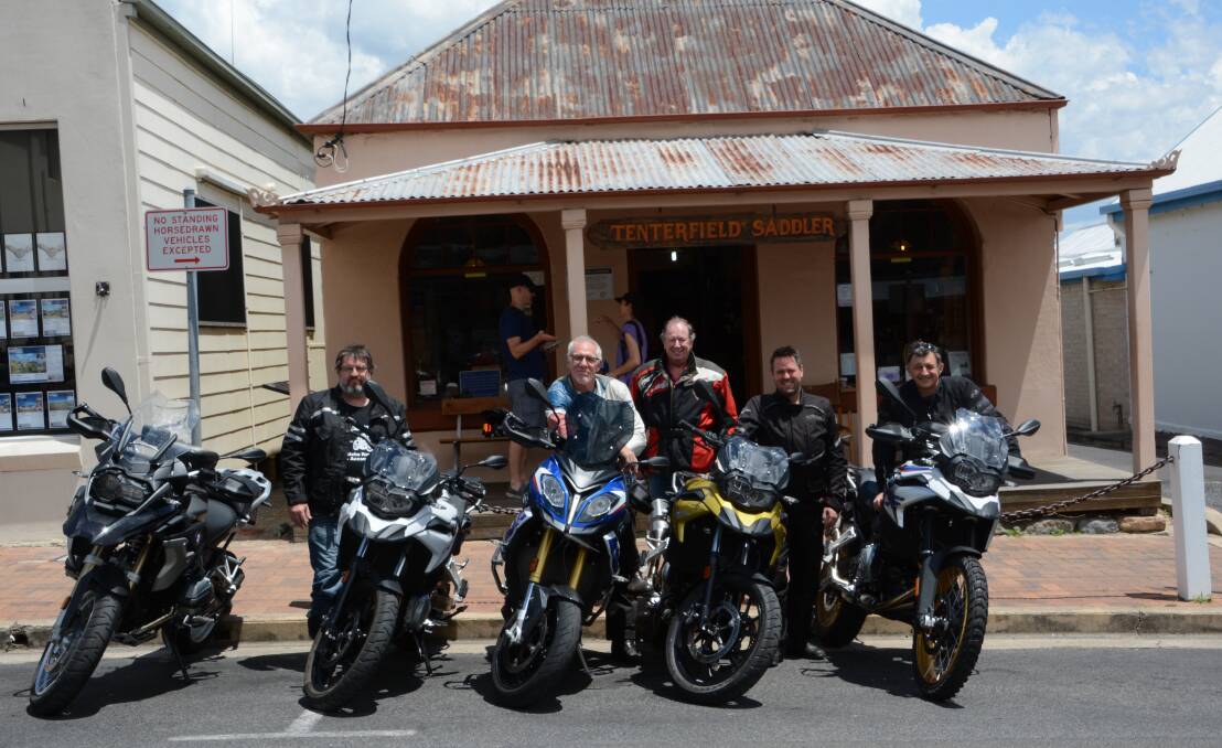 (From left) Rod Eime, Keith Austin, David McGonigal, Andrew Wilson and Phil Suriano check out the iconic Tenterfield Saddler on their New England High Country tour.