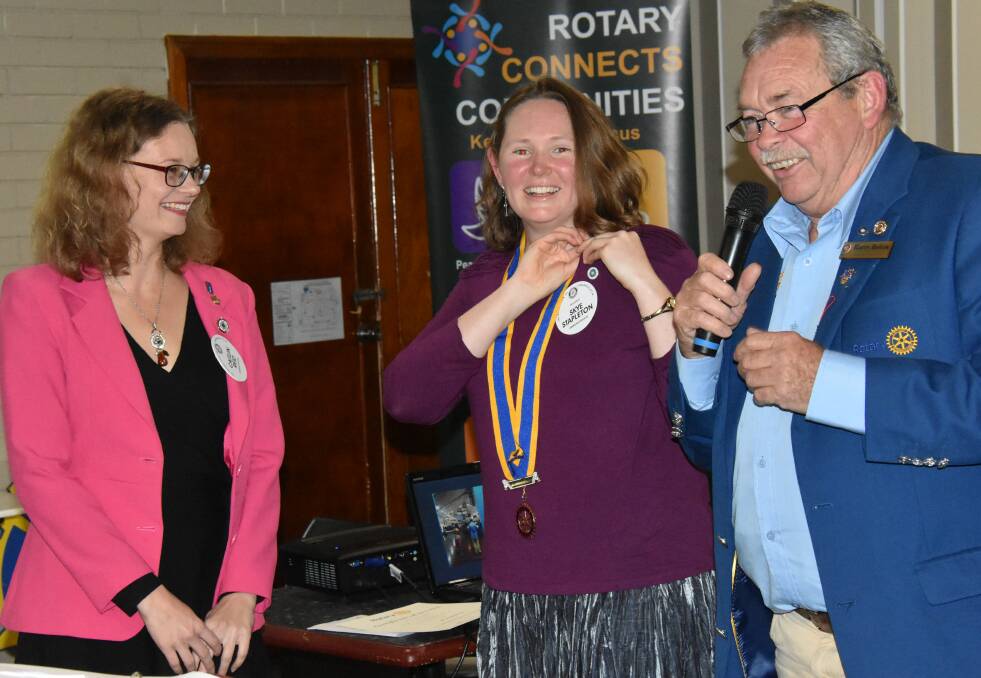 Looking forward, looking back: Incoming Rotary Tenterfield president Caitlin Reid with outgoing president Skye Stapleton and Harry Bolton, who becomes District Governor on Sunday.